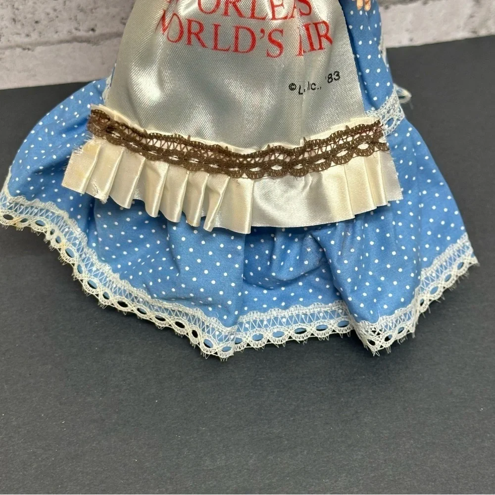 Vintage 1983 New Orleans World's Fair Big Eyes Doll Dress Bonnet Stand 10 in.
